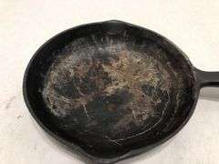 6 1/2” #2  3 notch skillet with heat ring and 2 spouts. Rounded interior surface. Made in Korea.