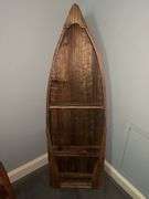 Collection of boat shaped shelving in various sizes