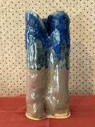 Beautifully designed and handcrafted Owl Eyes Pottery glaze drip vase (has appearance of dripping candle wax)…..9-1/2” tall….Owl Eyes Pottery are pieces designed by the seller and are food safe….has (1) firing defect