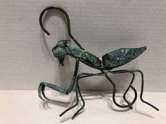 Metal garden grasshopper. Copper with green patina. 8” x 8” overall. Body 6” L