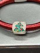 Elegant Brighton bangle with rhinestone Christmas tree charm and 2 red stone separators…..has magnetic closure and bag