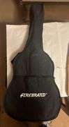Firebrand Junior Acoustic guitar in case with shoulder carry strap. Received as a gift and never touched so brand new.
