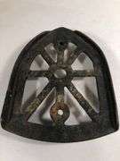 Antique cast iron trivet, specifically designed as a rest for a "sad iron" or "flat iron". 6 x 4.5”