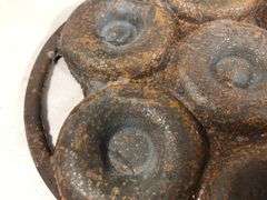 Rare unknown cast iron donut pan. Marked Pat. Pending. 7 donut slots. 10x 9.5”   Makes 3” diameter donuts