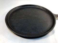 Lodge 9” old style griddle. USA  H 70G. Newly seasoned.