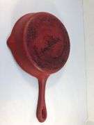BASICS cast iron red/white enameled 6 1/2” cast iron skillet. 2 spouts