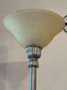 Gold tone floor lamp with glare glass shade…..70” tall