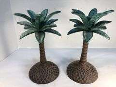 Unusual vintage pair of cast iron palm tree candle holders. Green and brown. 7 3/4” H. Base 4”W.