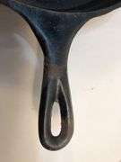 Lodge 10 1/2” 2 spout skillet with heat ring. No spin, no wobble.