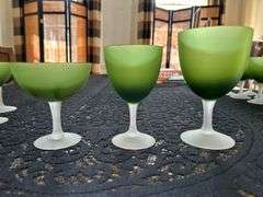 Collection of 25 pieces green and white satin glassware…..(7) 4-1/4” champagne, (9) 5-1/4” goblets and (9) 6” goblets…..there is chipping on some