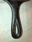 Griswold No. 8 cast iron skillet, identifiable by the "8-B" and "MADE IN USA". MM: D2
