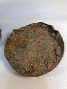 Antique smelting pot. 5” diameter. Plus round block of metal.
