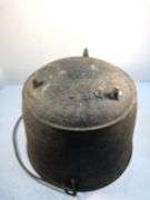 Antique gate marked 19th-century Louisiana cast iron sugar kettle. These large, spherical cast iron kettles were primarily used in the production of sugar on plantations in the American South, especially in Louisiana where sugarcane cultivation thrivedMarked 8 MG. 10” diameter. 8” H.