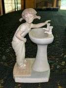 LLADRO “Clean Up Time" bisque porcelain figurine (#4838)……7-1/2” tall