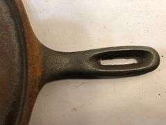 Wagner Ware cast iron griddle, specifically a No. 9 Sidney Arc Logo  Griddle. H G. 10.5” diameter. HS marked. No spin, no wobble.