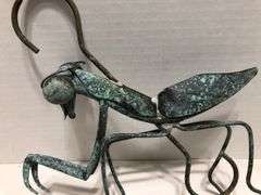 Metal garden grasshopper. Copper with green patina. 8” x 8” overall. Body 6” L