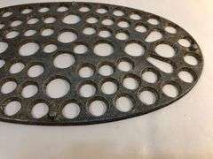 6 qt. Aluminum oval footed toaster trivet. 9. 1/2 x 5 1/2”.