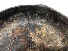 6 1/2” #2  3 notch skillet with heat ring and 2 spouts. Rounded interior surface. Made in Korea.
