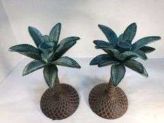 Unusual vintage pair of cast iron palm tree candle holders. Green and brown. 7 3/4” H. Base 4”W.