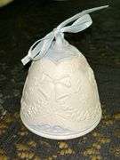 Grouping of (3) LLADRO bisque porcelain Christmas bells…..2 are the same and all 3 have clappers