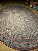 13-1/2’ x 9-1/4’ oval braided rug in really good condition…..there is a taped spot on back but didn’t find any loose braiding