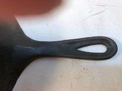 WAPAK #7  H 2 spout cast iron skillet with heat ring. #703. 9 1/2” diameter.