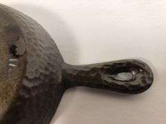 Hammered Salesman sample 4” diameter skillet. VI