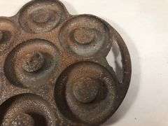 Rare unknown cast iron donut pan. Marked Pat. Pending. 7 donut slots. 10x 9.5”   Makes 3” diameter donuts