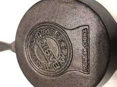BASICS Tools of the Trade skillet. 2 spouts. #4. 6” diameter. Made in China. No spin, no wobble.