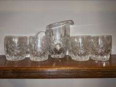 Shelf of crystal glassware……there is chipping on several…..please see all pics as I could not get one long shot of all