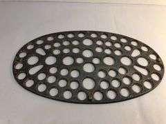 6 qt. Aluminum oval footed toaster trivet. 9. 1/2 x 5 1/2”.
