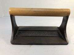 1978 Taylor & Co. bacon press.  Wooden handle. Decorative bottom; pig and floral 7.5 x 4.5”
