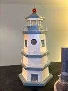 Nice selection of lighthouses made from various materials…..far left is musical (needs batteries, far right is a bank…..heights range from approx. 12-1/2 to 13-1/2” tall