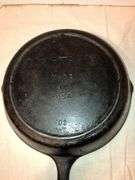 Griswold No. 8 cast iron skillet, identifiable by the "8-B" and "MADE IN USA". MM: D2