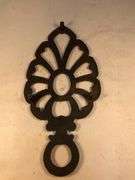 Vintage Wilton cast iron trivet. 8 x 4”.