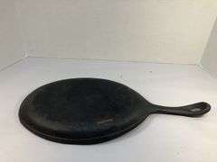 Oval fajita skillet/sizzler 15” L.  9.5 x 7” cooking surface. 0 on underside of handle is the only marking.