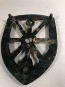 Antique cast iron trivet, specifically designed as a rest for a "sad iron" or "flat iron". 6 x 4.5”