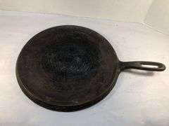 Wagner Ware cast iron griddle, specifically a No. 9 Sidney Arc Logo  Griddle. H G. 10.5” diameter. HS marked. No spin, no wobble.