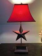 Nice looking resin base lamp with star center and red rectangular shade…..26-2/2” tall