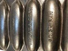 Rare Griswold No. 2700 wheat/corn design cornbread stick pan. #632. Erie, PA.  USA.  13 x 6”. Valued at $475 to 600.