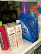 Slide-in laundry caddy and contents…..24-3/4 x 8-1/4 x 31-1/2 tall…..all contents are partial boxes and bottles