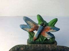 Vintage Dragonfly cast iron footed soap/sponge dish. Blue, orange & white dragonfly sitting on green grass. 4” h x 6” w x 4.5” d.