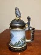 (2) very nice owl home decor items…..left is a pitcher by Fitz & Floyd and stands 8-3/4” tall (1 tiny chip on back log)…..right is an Opa’s Haus Inc. Edition owl themed stein  from The American Wildlife Stein Series (9” tall)