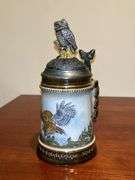 (2) very nice owl home decor items…..left is a pitcher by Fitz & Floyd and stands 8-3/4” tall (1 tiny chip on back log)…..right is an Opa’s Haus Inc. Edition owl themed stein  from The American Wildlife Stein Series (9” tall)