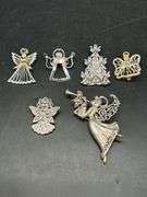 Beautiful grouping of angel brooches