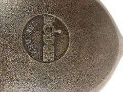 Lodge oval sizzle server #2. Surface area 9.5 x 7”. Not seasoned. No spin or wobble.