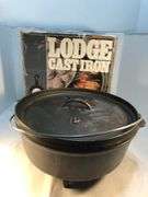 Lodge #12 12” 6 quart outdoor Dutch oven with flanged lid and integral legs. Stored in original box. Possibly new.
