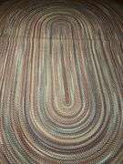 13-1/2’ x 9-1/4’ oval braided rug in really good condition…..there is a taped spot on back but didn’t find any loose braiding