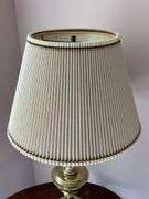 Solid brass lamp with nice pleated shade….31-1/2 tall