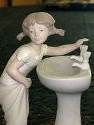 LLADRO “Clean Up Time" bisque porcelain figurine (#4838)……7-1/2” tall